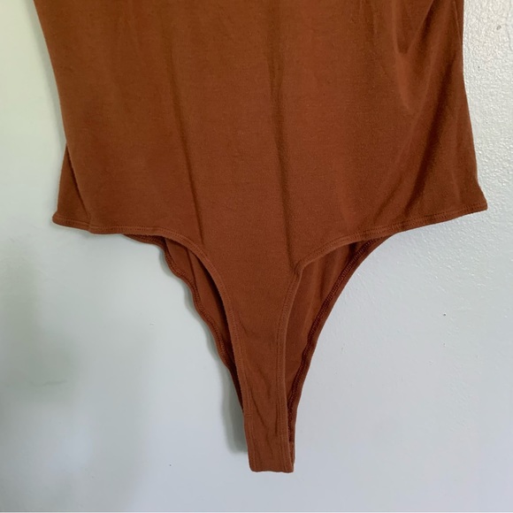 EUC Beautiful Comfy Soft Hook and Eye Corset Style Short Sleeve Thong Bodysuit - Picture 12 of 14